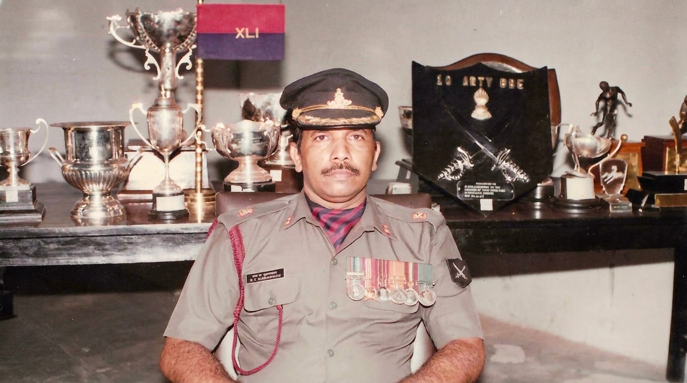 With the regiment’s trophies and colours