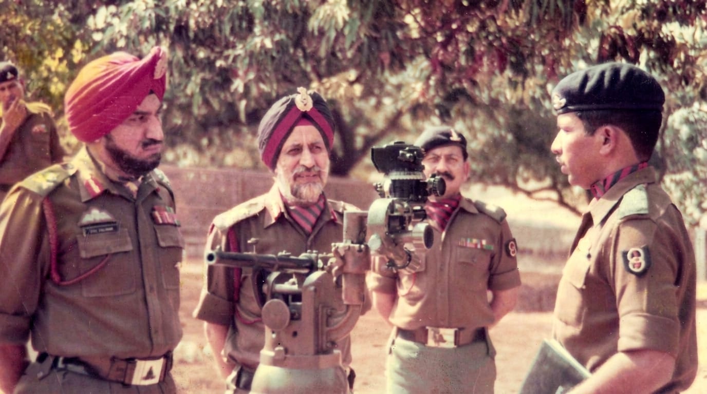 At a gun position with senior officers