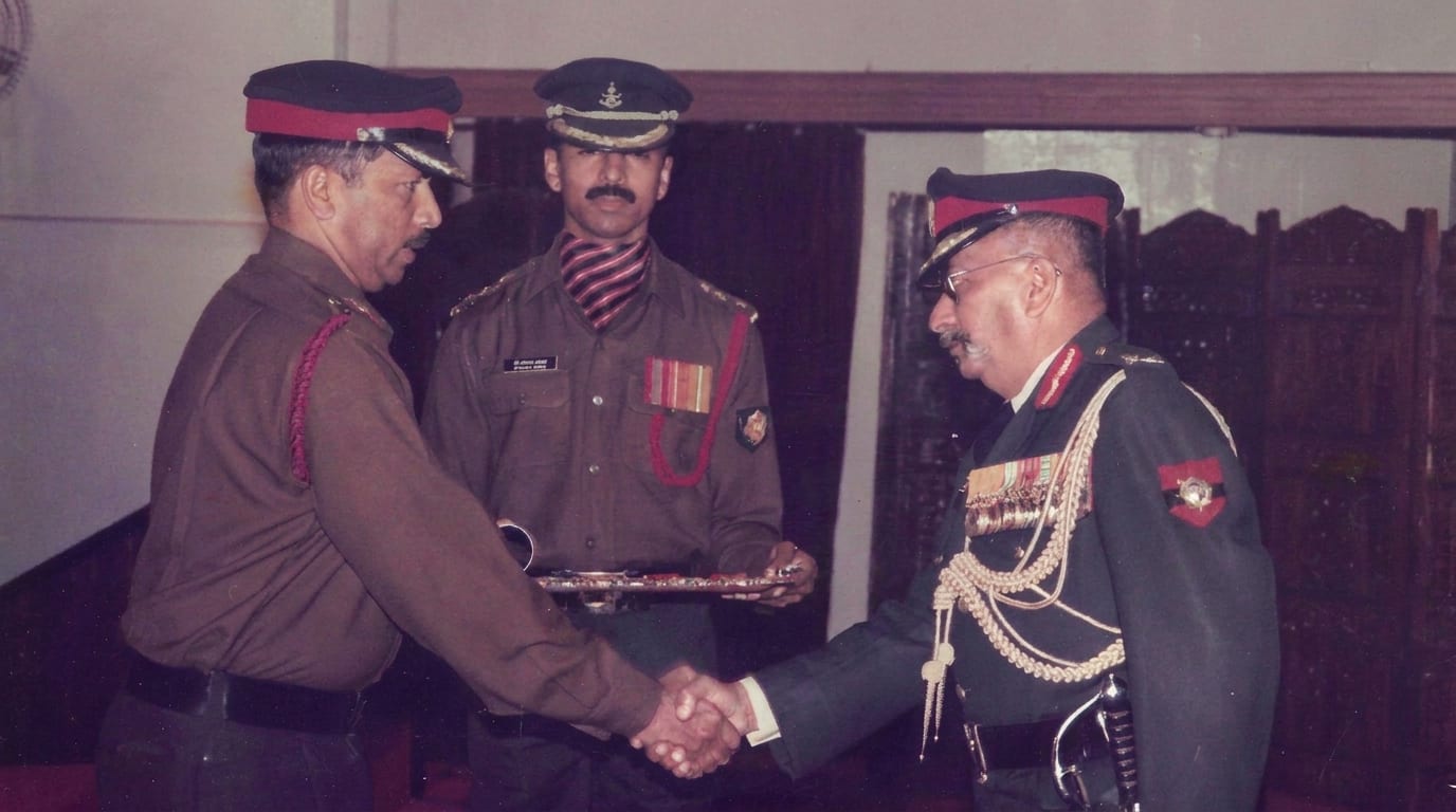 Being felicitated by a senior officer